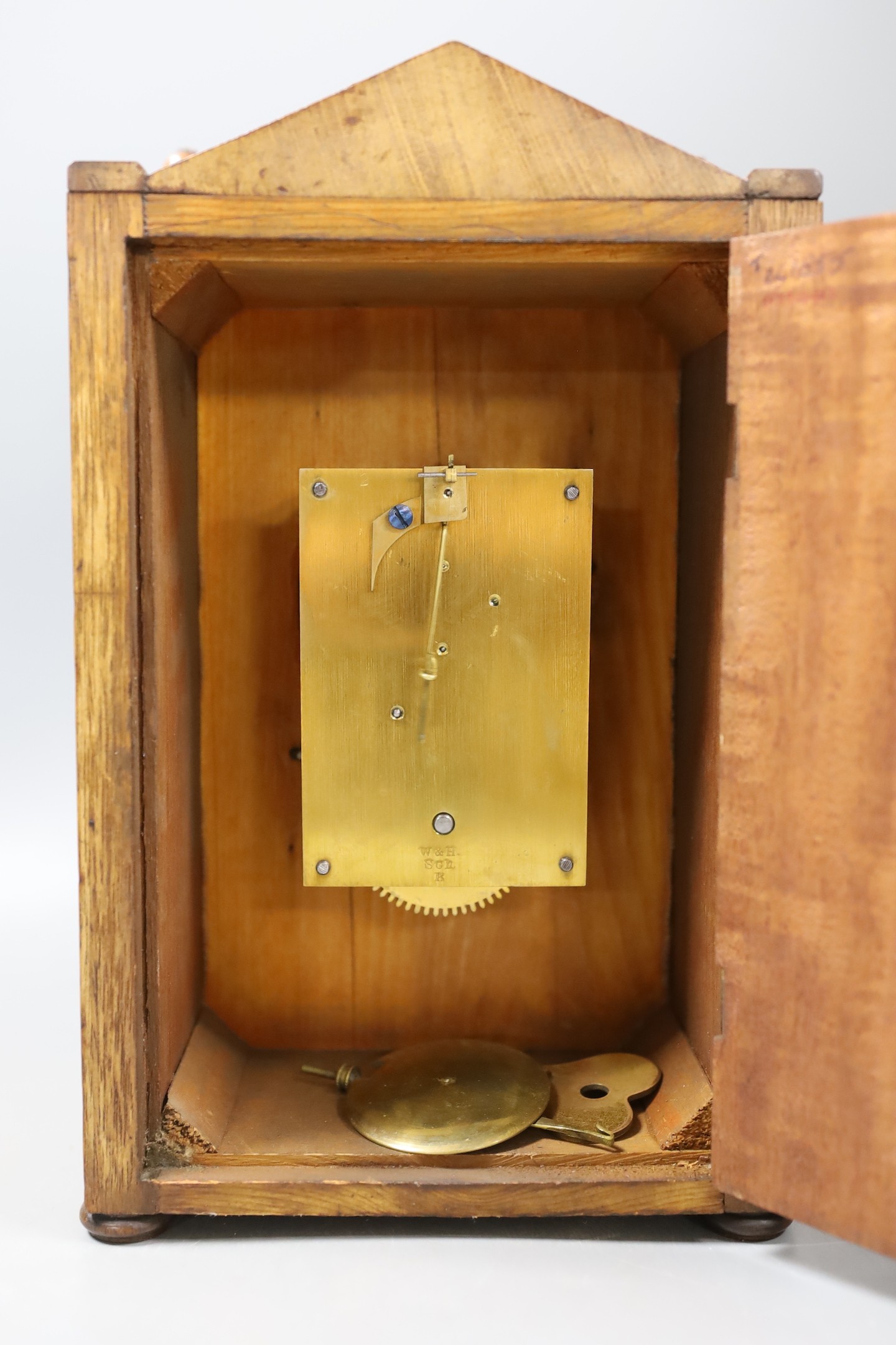 A late 19th century mantel clock in a walnut and Tunbridgeware banded case